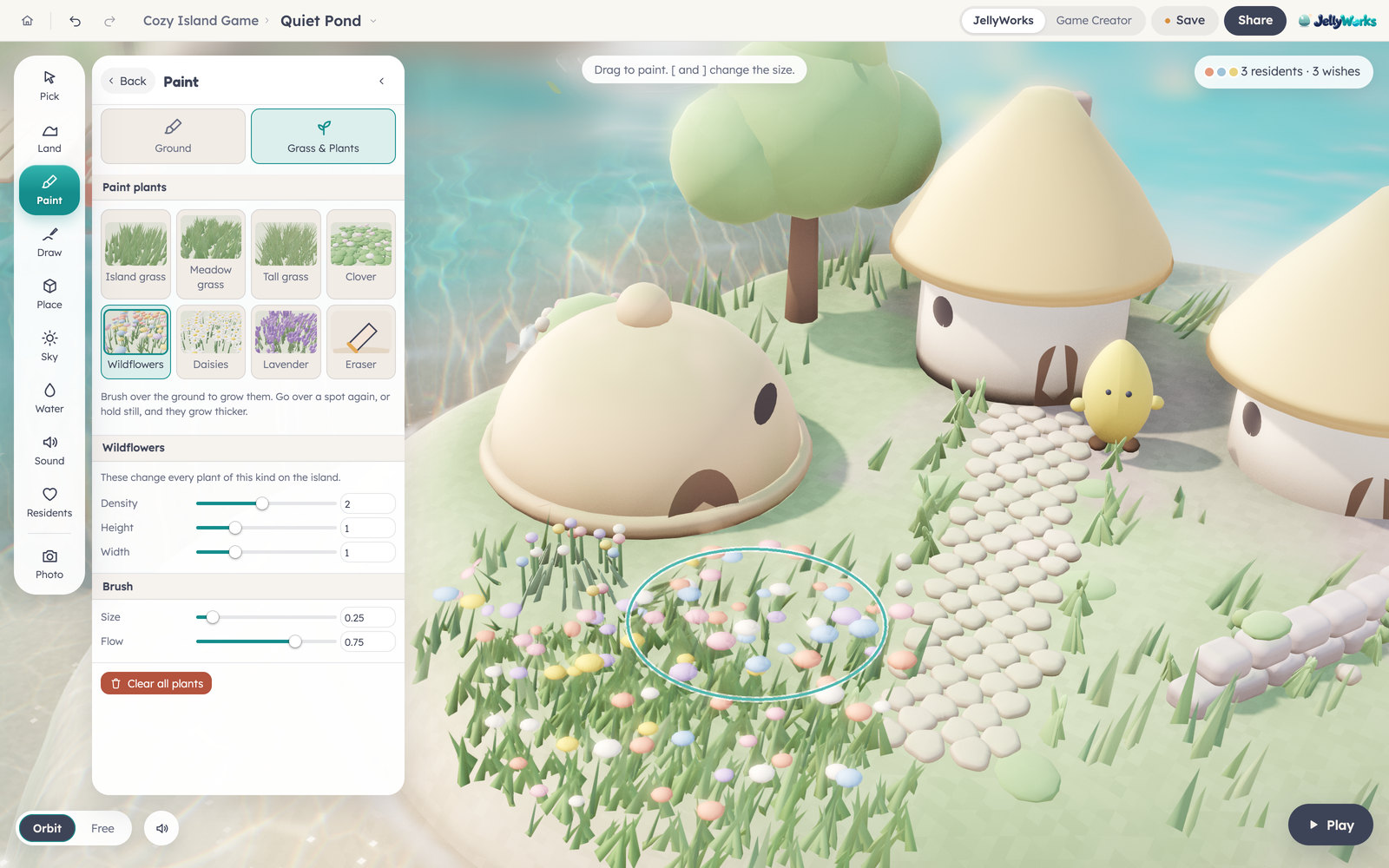 Painting grass and wildflowers onto the island